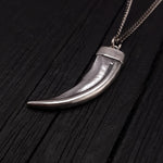 This 3D honey badger claw pendant is cast from a real claw in solid sterling silver. It measures 1-3/4" around the curve with an eye catching bright polished finish.