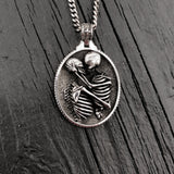 Silver necklace with detailed skeleton pendant, intricate design | Moon Raven