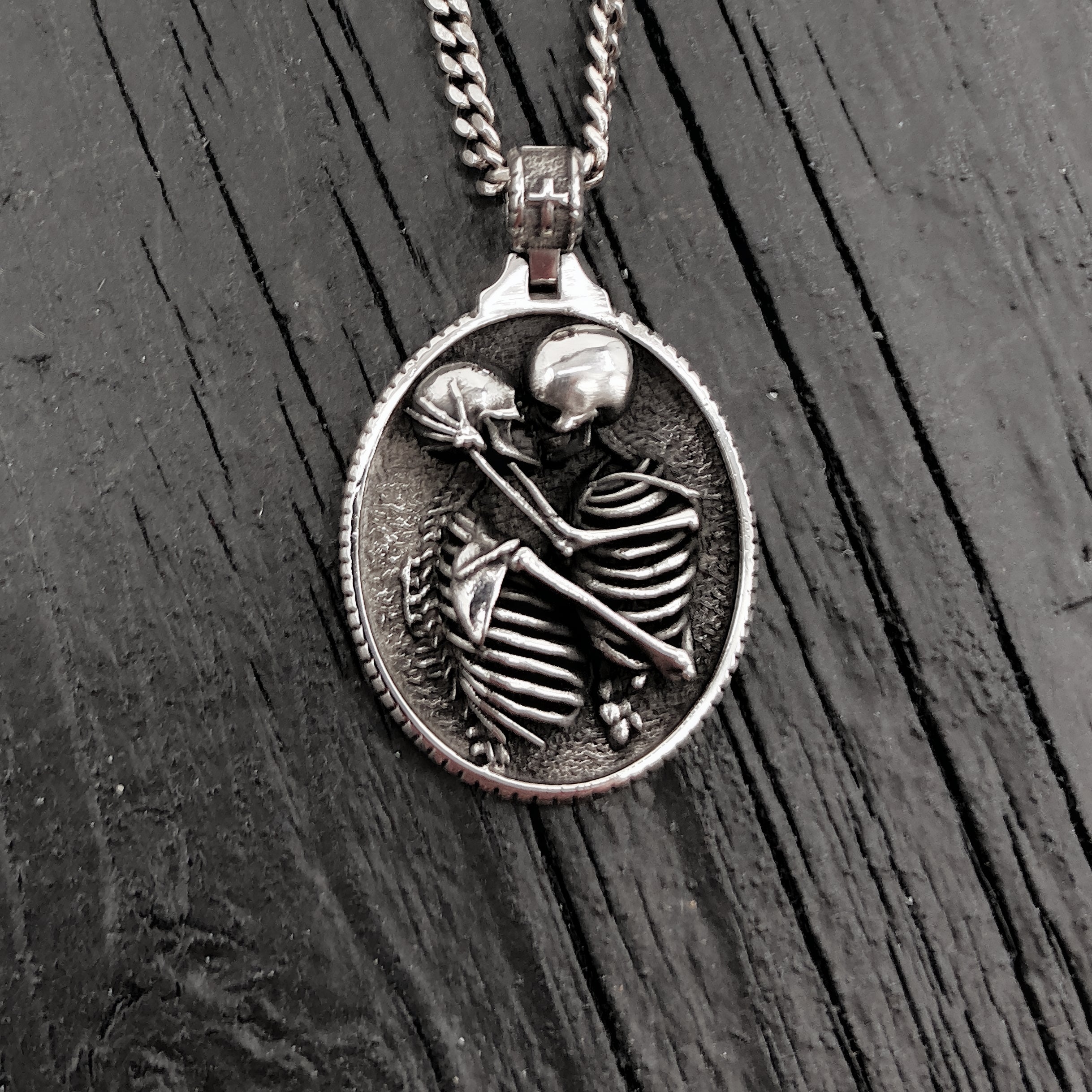 Silver necklace with detailed skeleton pendant, intricate design | Moon Raven