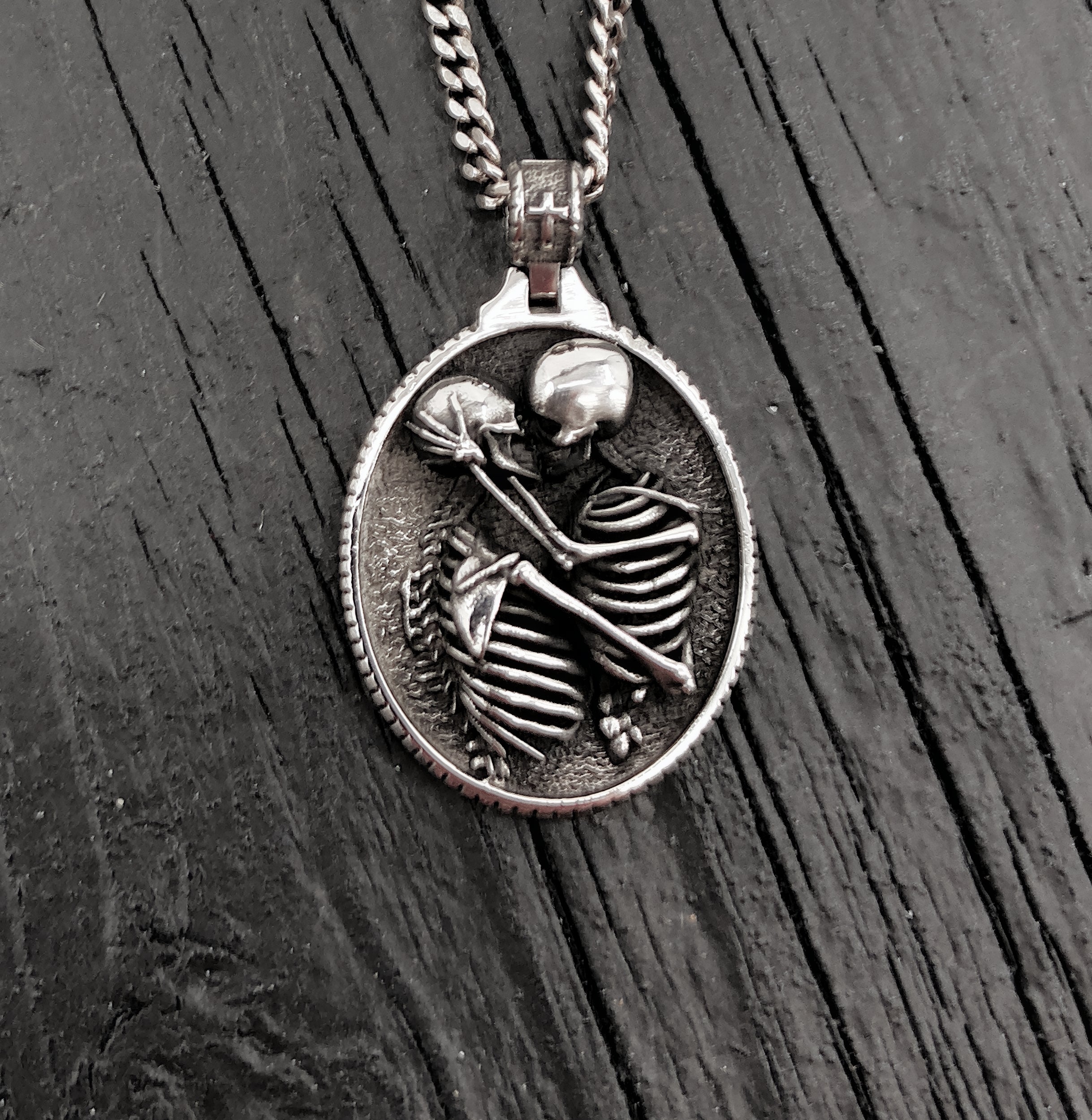 Silver necklace with detailed skeleton pendant, intricate design | Moon Raven