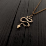 Gold chain necklace with detailed snake pendant | Moon Raven