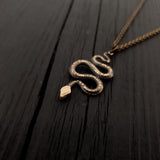 Gold chain necklace with detailed snake pendant | Moon Raven