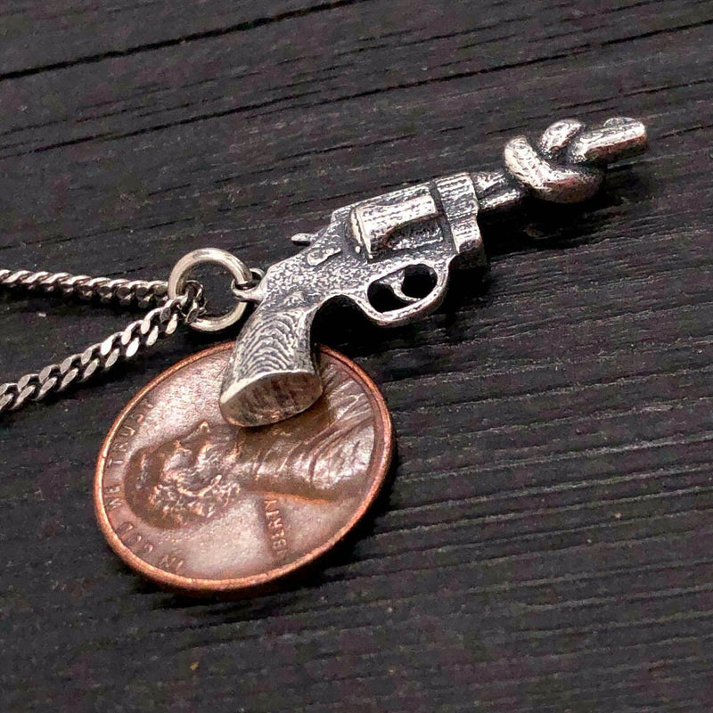 Sterling Silver Knotted Gun Pendant: Symbol of Peace and Non-Violence, Symbolic Jewelry,