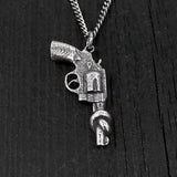 Sterling Silver Knotted Gun Pendant: Symbol of Peace and Non-Violence, Symbolic Jewelry,