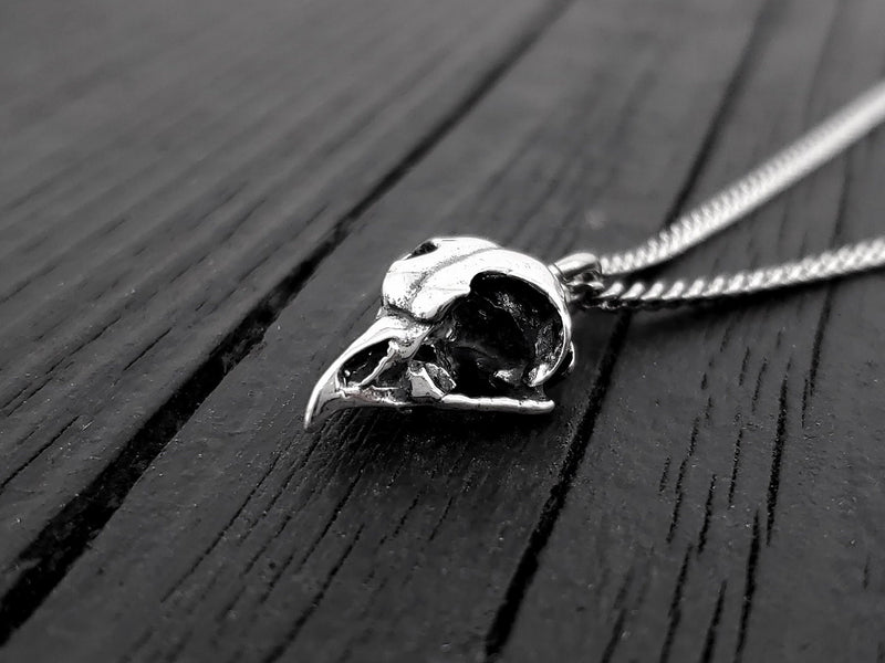 This Great Horned owl skull necklace, a mere 11/16&quot; long is cast in solid 925 sterling silver. It is a perfectly proportional 3D miniature of a real great horned owl skull and retains all the unique details of the life size skull.